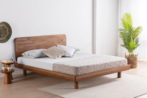 Tmavě hnědá dřevěná postel LUNA Lucas